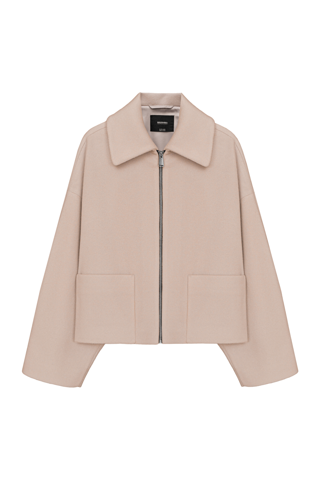 Куртка-жакет из шерсти. Модель со спущенной линией плеч, отложным воротником и накладными карманами. Застежка на молнию. Изделие выполнено на подкладке.