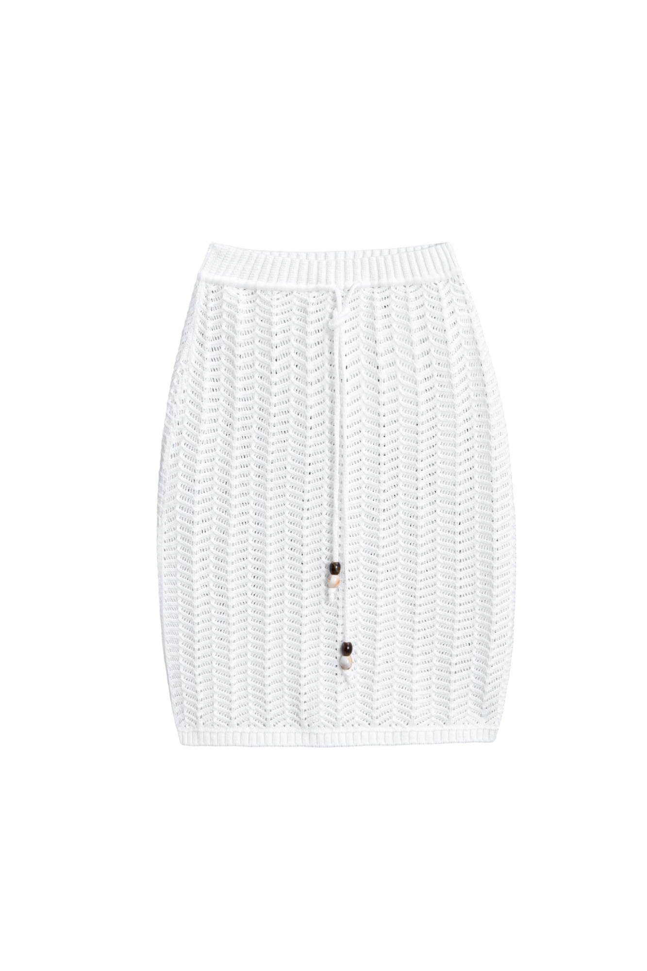 Трикотажная юбка длины мини из хлопка. Модель по фигуре, с эластичным поясом в рубчик, дополненным кулиской. Изделие выполнено узором "ёлочка".