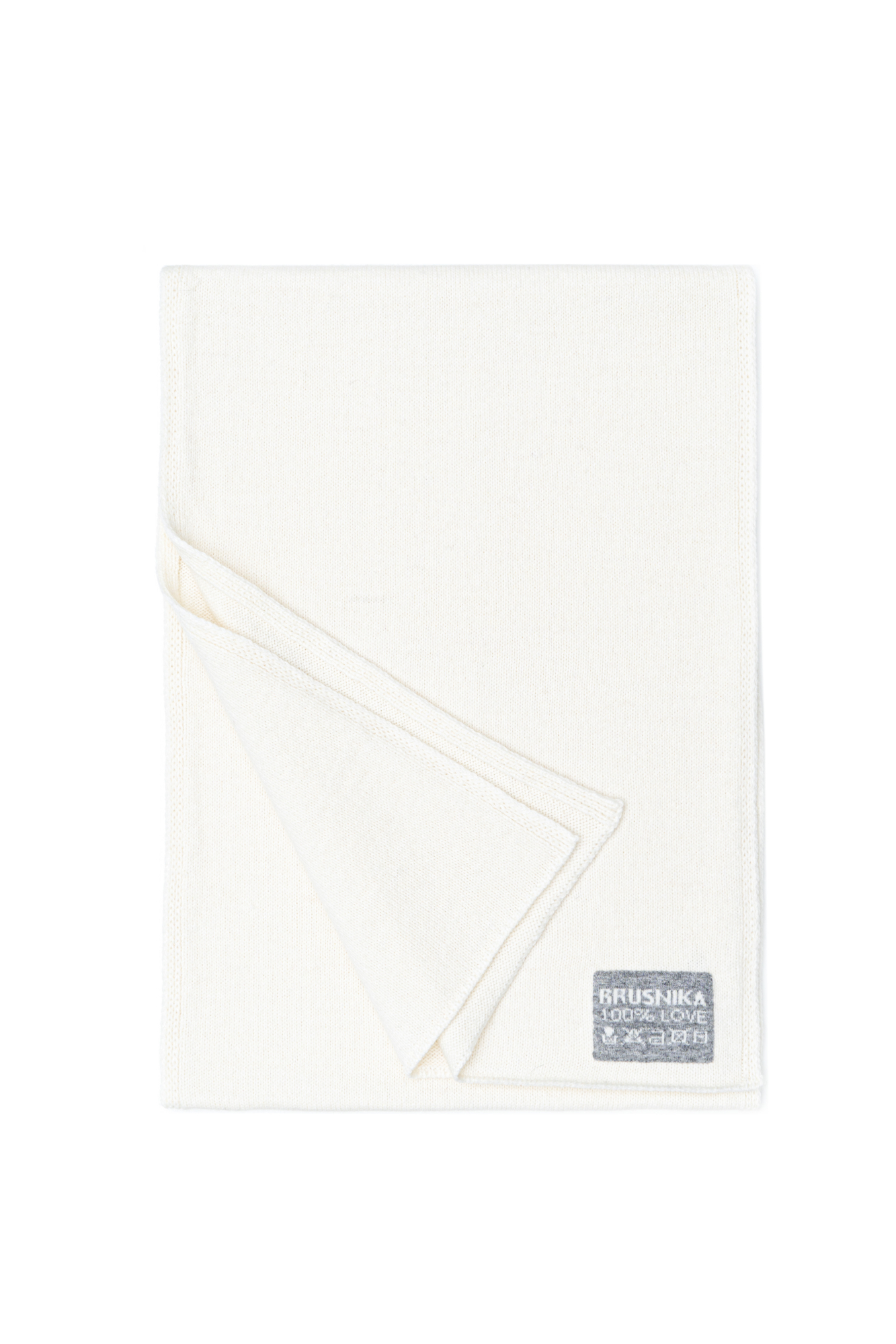 Трикотажный шарф из шерсти альпака с брендированным ярлыком.