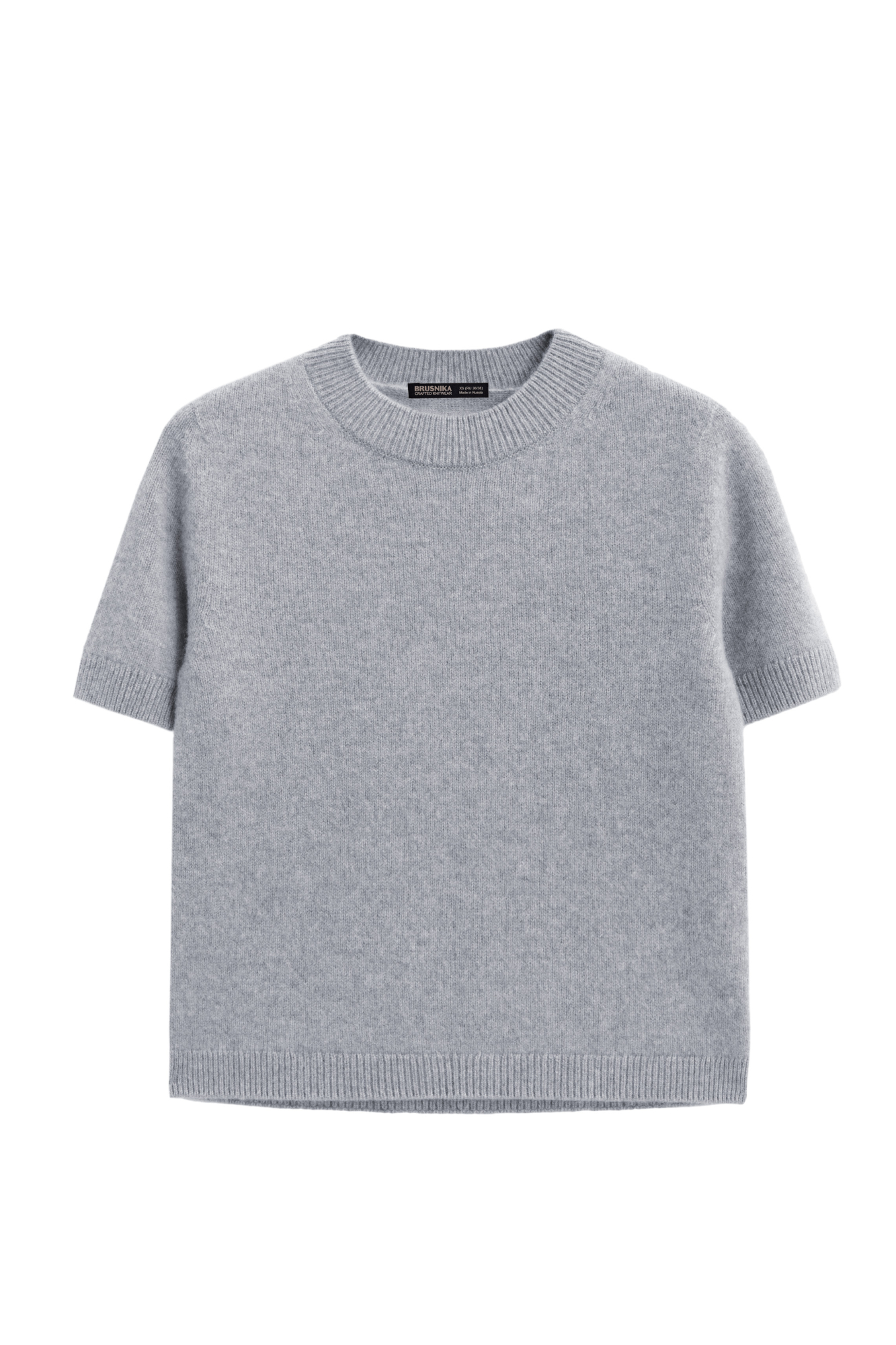 Трикотажная футболка из 100% кашемира. Модель свободного силуэта, с коротким рукавом и круглым вырезом горловины. Края изделия выполнены в рубчик.