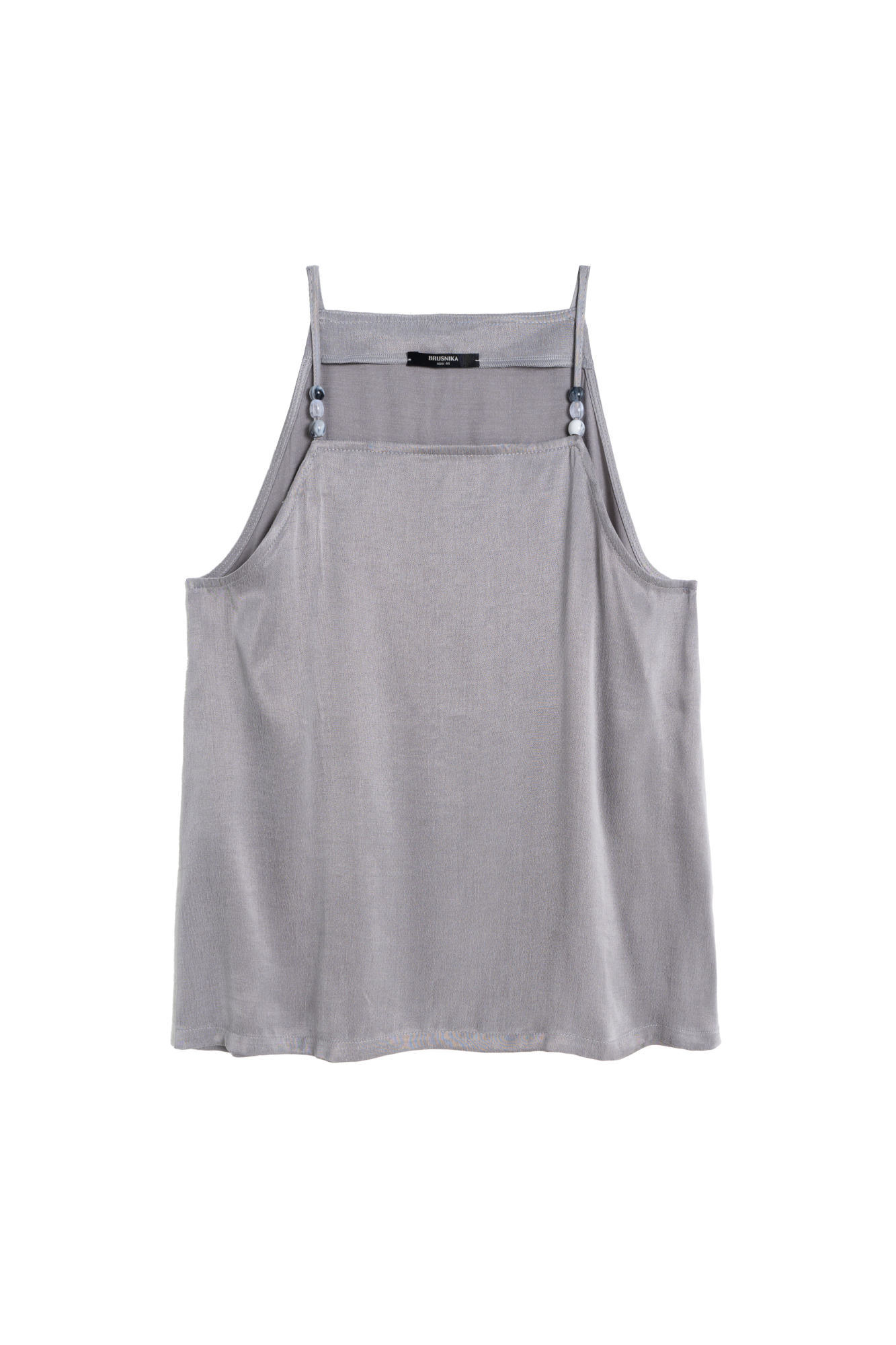 Топ из купры. Модель свободного силуэта, с прямым неглубоким вырезом, на тонких бретельках, декорированных бусинами.