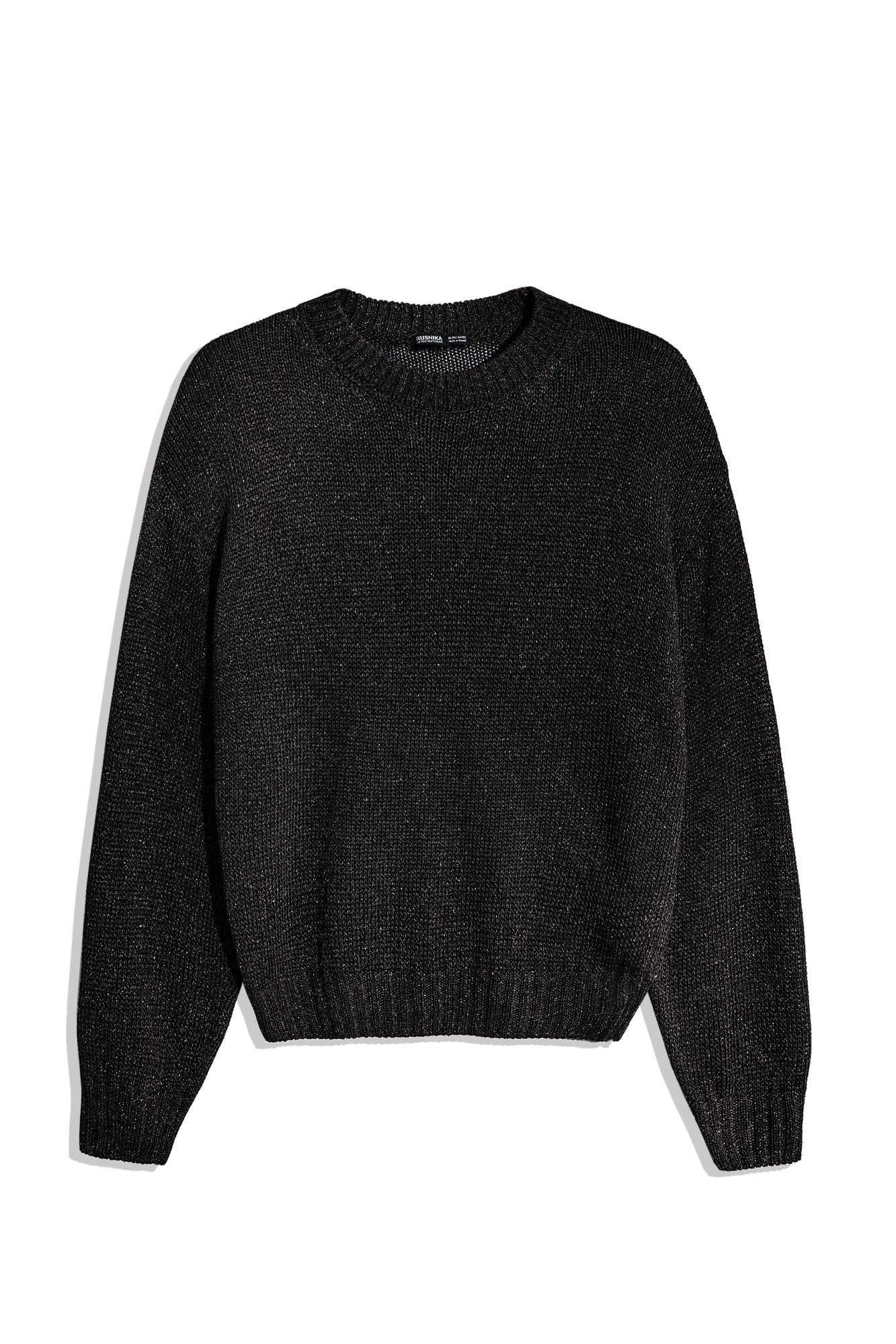 Джемпер из вискозы с люрексом. Модель в круглым вырезом горловины. Края изделия выполены в широкий рубчик.