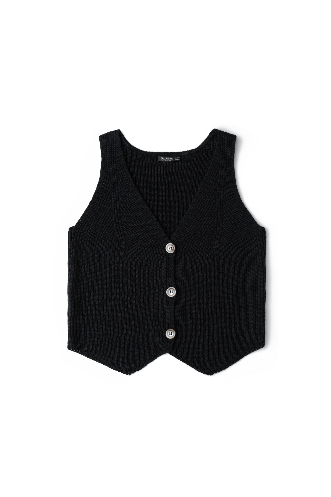 Трикотажный жилет из шерсти. Модель прямого кроя с V-образным вырезом и застежкой на пуговицы. Дополнить образ можно юбкой в таком же стиле.