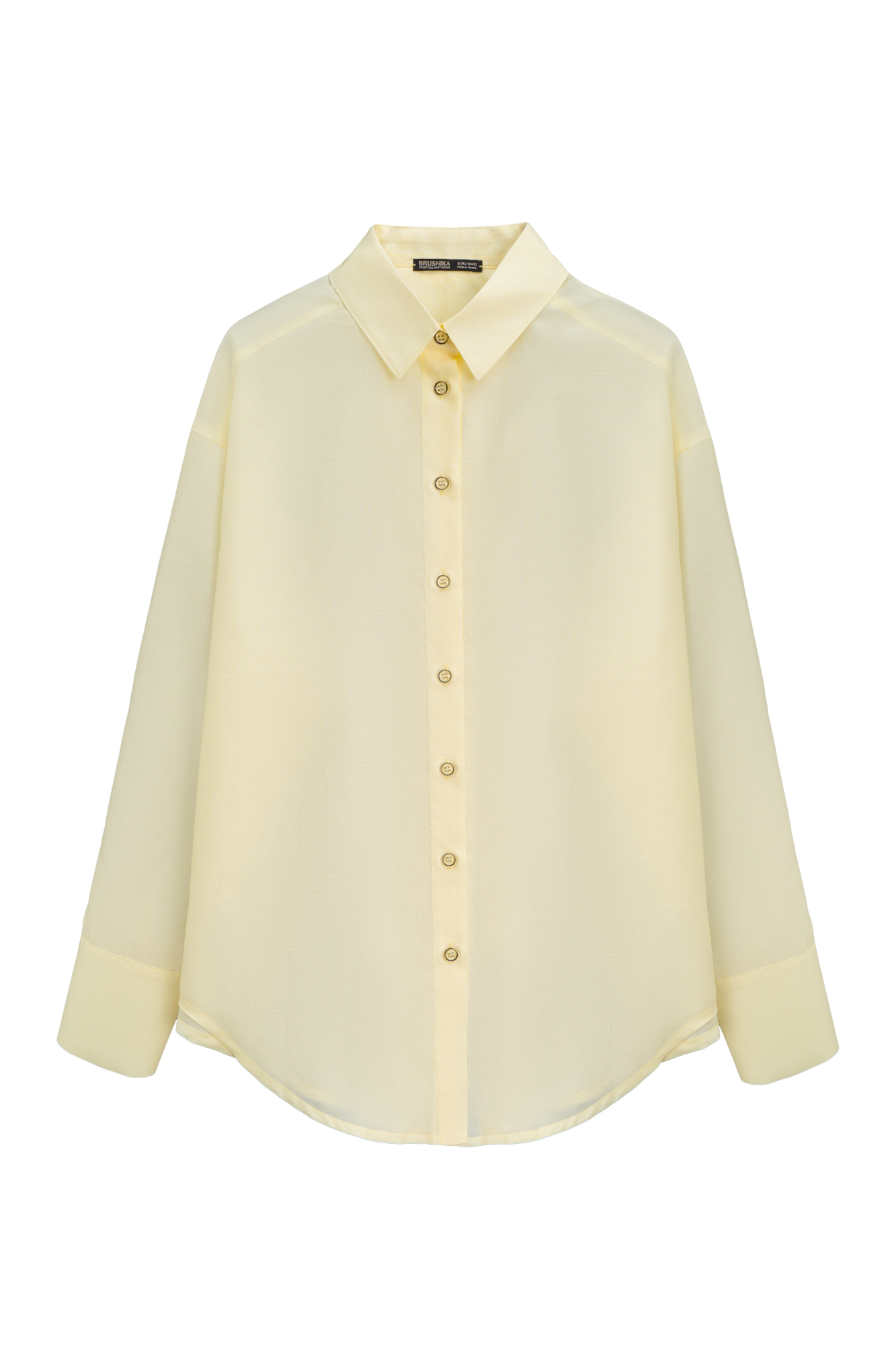 Классическая рубашка из тонкого шелка и хлопка. Модель свободного кроя, с отложным воротником, длинными рукавами с манжетами на пуговицах. Нижний край изделия выполнен полукругом. Застежка на пуговицы.