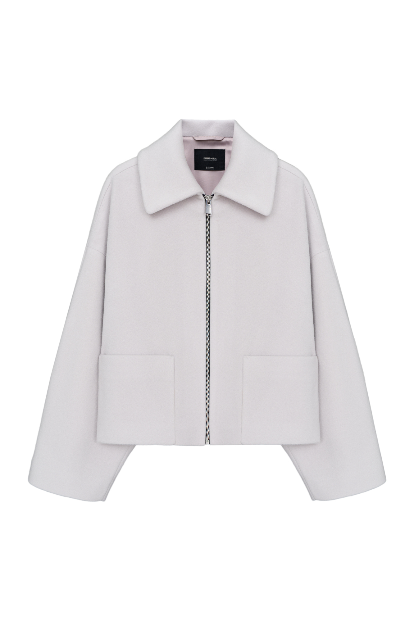 Куртка-жакет из шерсти. Модель со спущенной линией плеч, отложным воротником и накладными карманами. Застежка на молнию. Изделие выполнено на подкладке.