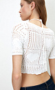 Короткий ажурный топ в стиле пэчворк. Модель с коротким рукавом, круглым вырезом горловины и кулиской. 