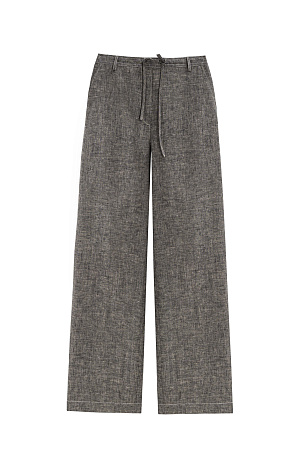 бежевый Брюки из 100% льна. Модель прямого кроя, со шлевками на поясе для ремня, боковыми карманами и регулирумоей кулиской. Изделие декорировано строчкой контрастного цвета.