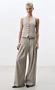 Брюки палаццо из смесовой шерсти со складкми. Модель с высокой посадкой и широким поясом со шлевками для ремня. 