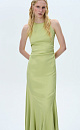 Атласное платье длины макси. Модель приталенного силуэта, с круглым вырезом горловины, без рукавов. Модель декорирована асимметричной юбкой и драпировкой на талии.