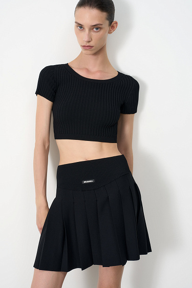 Трикотажная юбка плиссе в теннисном стиле