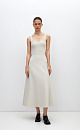 Трикотажное платье длины миди из плотной вискозы. Модель без рукавов, на широких бретелях и юбкой А-силуэта. Застежка на молнию сзади.