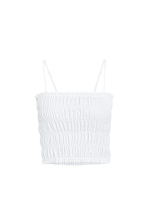 белый Топ&nbsp;&nbsp;с эластичными сборками на тонких регулируемых бретелях. Дополнить образ можно юбкой в таком же стиле.