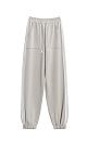 Трикотажные брюки-джоггеры из вискозы. Модель выполнена в спортивном стиле, с эластичным поясом со шнурком, боковыми карманами и манжетами на резинке. Изделие декорировано широкими лампасами контрастного цвета. 