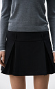 Юбка длины мини из поливискозы. Модель с высоким поясом, дополненым шлевками для ремня. Изделие декорировано закрытыми веерными складками. Застежка на молнию.