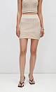 Трикотажная юбка мини из 100% хлопка с эластичным поясом в рубчик. Дополнить образ можно топом.