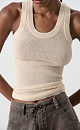 Трикотажный полупрозрачный топ из 100% хлопка. Модель приталенного силуэта, с глубокой проймой и круглым вырезом горловины. Изделие выполнено в рубчик.