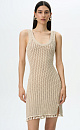 Трикотажное платье длины мини фактурной вязки из хлопка. Модель приталенного силуэта, с U-образным вырезом горловины и широкими бретелями. Изделие декорировано тесьмой с ракушками и пайетками .