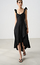 Сарафан длины миди из 100%&nbsp;&nbsp;льна. Модель без рукавов на широкиз лямках с оборками, открытой спиной, асимметричным низом и воланами на юбке. 
