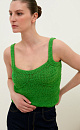 Трикотажный топ из хлопка с добавлением акрила. Модель на тонких бретелях с вывязанным лифом.