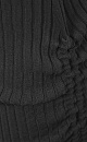Трикотажная юбка длины мини из вискозы. Модель с драпировкой по бокам, регулируемой кулиской и эластичным поясом на резинке. Дополнить образ можно топом в таком же стиле. 