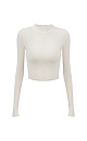 Трикотажный кроп-топ из вискозы с длинным рукавом, круглым вырезом горловины и фигурным низом. Края изделия выполнены в рубчик.