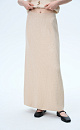 Трикотажная юбка длины макси из хлопка с добавлением вискозы. Модель свободного силуэта с эластичным поясом в рубчик. Дополнить образ можно жилетом в таком же стиле.