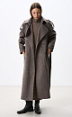 Длинное двубортное шерстяное пальто с добавлением верблюжьей шерсти. Модель прямого свободного силуэта с отложным воротником и боковыми карманами. Изделие декорировано отлетной кокеткой и широкими лацканами на плечах. На талии расположены шлевки, через которые продевается пояс, выполненный из того же материала, что и пальто. Без подкладки. 