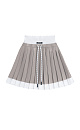 Трикотажная юбка плиссе длины мини из вискозы. Модель с широким эластичным поясом в рубчик. Пояс и нижняя часть юбки выполнены из пряжи контрастного цвета.