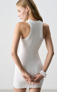 Платье длины мини из фактурного трикотажа на основе вискозы. Модель приталенного силуэта, без рукавов, на широких бретельках, с U-образным вырезом горловины. Изделие выполнено в широкий рубчик. 
