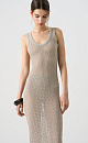 Трикотажный ажурный сарафан из вискозы. Модель свободного силуэта, без рукавов, на тонких бретельках и открытой спиной. Вязка выполнена узором "ёлочка", края изделия выполнены в рубчик.