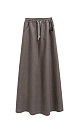Юбка длины макси из 100% льна. Модель свободного силуэта с эластичным поясом на кулиске и боковыми карманами. Дополнить образ можно топом в том же стиле. 