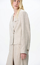 Укороченный жакет на запах из 100% льна. Модель приталенного силуэта с карманом на груди. Застежка на пуговицу. Дополнить образ можно брюками в таком же стиле.