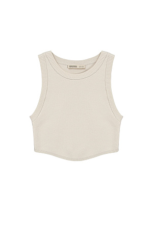 бежевый Трикотажный кроп-топ из поливискозы с круглым вырезом горловины и неровным низом. Края изделия выполнены в рубчик.