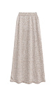 Трикотажная юбка длины макси из хлопка с добавлением вискозы. Модель А-силуэта, с широким эластичным поясом на резинке. Изделие декорировано маленькими пайетками.