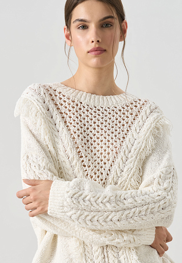 Джемпер изо льна с бахромой и косами