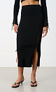 Трикотажная юбка длины миди из вискозы. Модель приталенного силуэта с эластичным поясом. Симметричная шнуровка по бокам. Дополнить образ можно топом в таком же стиле.