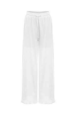 белый Широкие свободные брюки на кулиске из 100% хлопка с боковыми карманами.