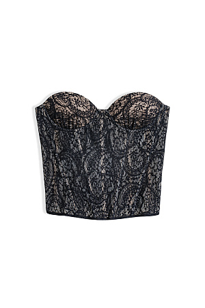 черный Корсет из тонкого кружева на контрастной подкладке с чашечками и шнуровкой по спинке. Дополнить образ можно юбкой в таком же стиле.