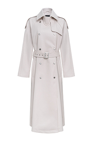 молочный Тренч из экокожи на подкладке. Модель свободного силуэта с боковыми карманами и длинными рукавами. В комплекте съемный пояс из основного материала. Ворот и пояс застегиваются на металлическую пряжку. Застежка тренча на кнопки.