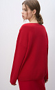 Трикотажный джемпер из шерсти с добавлением кашемира. Модель свободного силуэта со спущенной линией плеч и V-образным вырезом горловины. Манжеты рукавов и низ изделия выполнены в рубчик.