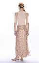 Юбка длины макси, расшитая пайетками и бисером. Застежка на потайную молнию. Изделие на подкладке.