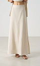 Юбка длины макси из 100% льна. Модель прямого кроя, с небольшим разрезом сбоку, эластичным поясом на резинке и застежкой на молнию. 