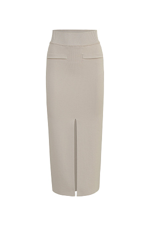 бежевый Трикотажная юбка-карандаш длины миди из вискозы. Модель приталенного силуэта с разрезом спереди, задними карманами и широким эластичным поясом.