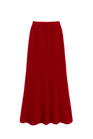 красный Трикотажная юбка длины макси из пуха лисы. Модель А-силуэта, с эластичным поясом на резинке и валиком по низу подола. Дополнить образ можно джемпером в таком же стиле.
