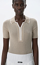 Трикотажная футболка-поло из 100% хлопка. Модель приталенного силуэта, с коротким рукавом, отложным воротником и застежкой на потайную молнию. Изделие декорировано бежевой отделкой на воротнике и вдоль планки. 