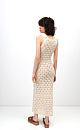 Облегающий ажурный сарафан из 100% хлопка. Модель с круглым вырезом горловины и небольшим расклешением юбки к низу. Изделие декорировано валиком с эффектом закручивания по краю подола. Края пройм и горловина выполнены в рубчик.