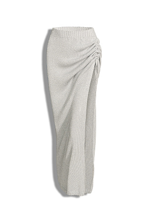 бежевый Трикотажная юбка длины макси из вискозы с люрексом. Модель облегающего силуэта, с эластичным поясом в рубчик и разрезом от бедра с кулиской. Дополнить образ можно топом в таком же стиле.