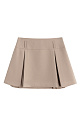 Юбка длины мини из поливискозы. Модель с высоким поясом, дополненым шлевками для ремня. Изделие декорировано закрытыми веерными складками. Застежка на молнию.