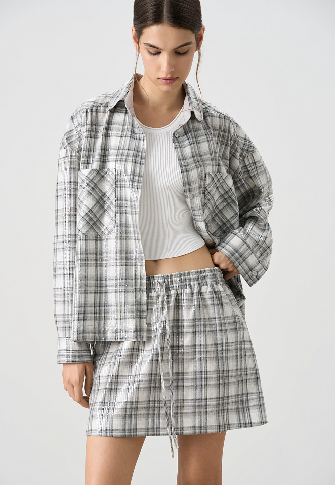 Юбка в клетку с пайетками
