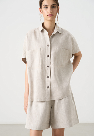 серый Свободная рубашка из 100% льна. Модель прямого кроя, без рукавов, с отложным воротником, двумя нагрудными карманами и застежкой на пуговицы.&nbsp;&nbsp;